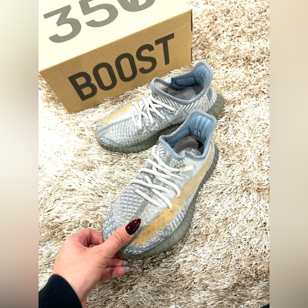 Yeezy shoes (women size 6= US. Men's Size 4.5)